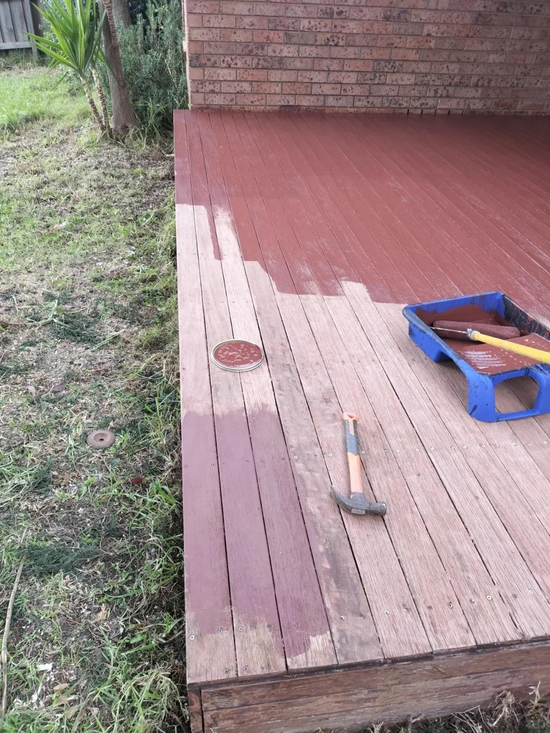 Timber deck receiving a protective coating