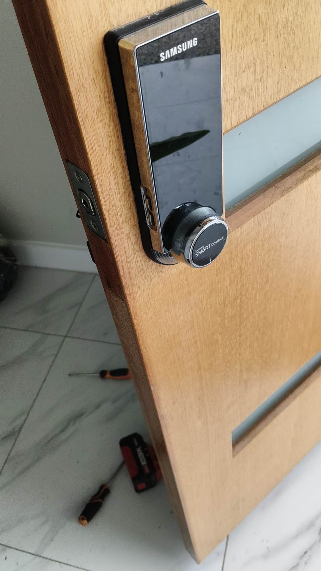 Fitted electronic door lock on a timber door