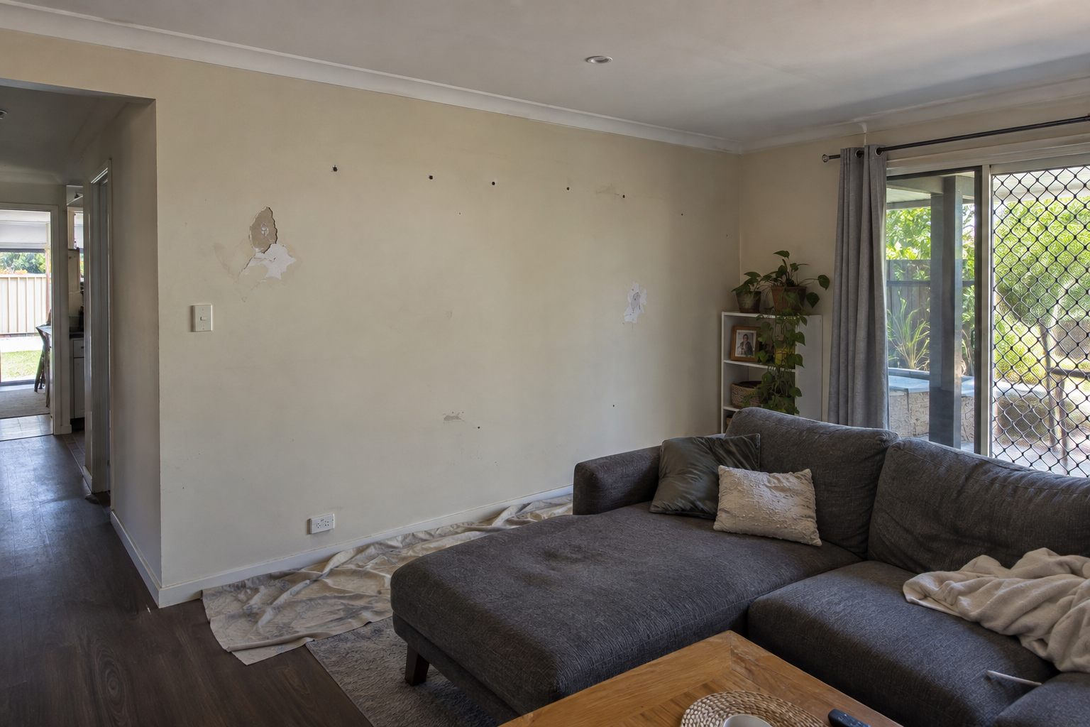 Visible wall surface damage before repair